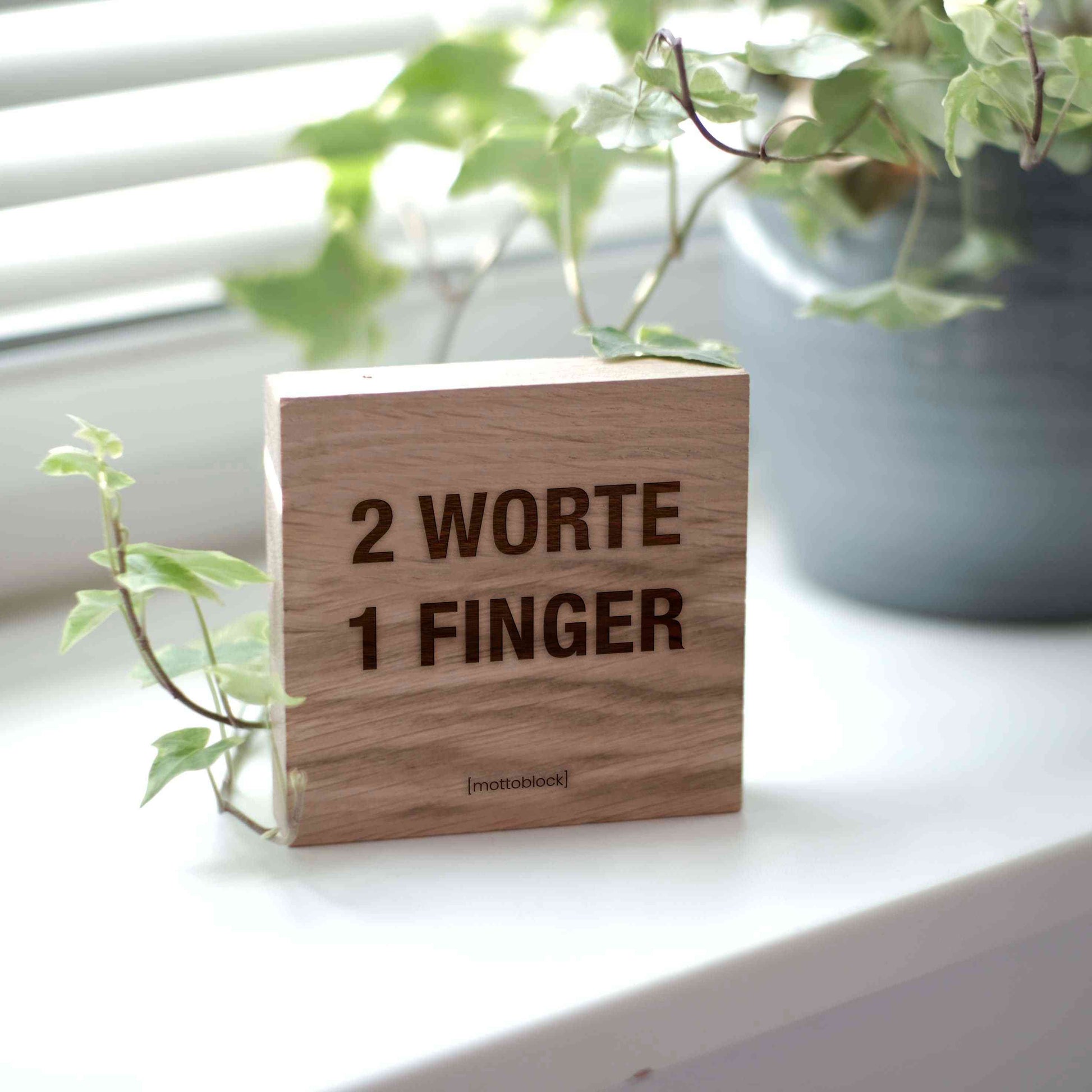 mottoblock | 2 Worte, 1 Finger